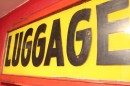 Folky Luggage Sign